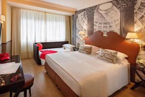 Letto o letti in una camera di Starhotels Michelangelo Rome