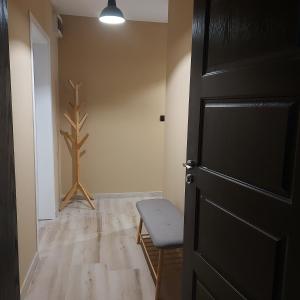 Ένα ή περισσότερα κρεβάτια σε δωμάτιο στο Sunny Fox Apartment +1 φωτογραφίες
