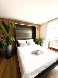 Posteľ alebo postele v izbe v ubytovaní Apartament Kamień i Morze + 23 fotografií