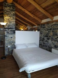 Postel nebo postele na pokoji v ubytování Appartamento del Meo