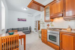 Η κουζίνα ή μικρή κουζίνα στο Appartamento Roma - La Casetta di Vale