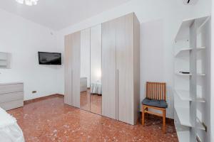 Μια τηλεόραση ή/και κέντρο ψυχαγωγίας στο Appartamento Roma - La Casetta di Vale