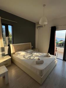 Postel nebo postele na pokoji v ubytování Privé City Hotel