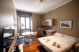 Una cama o camas en una habitación de Darsena Navigli Luxury Living