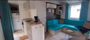 Kuchnia lub aneks kuchenny w obiekcie Mobil home Premium Camping 5*