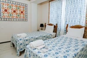 Ένα ή περισσότερα κρεβάτια σε δωμάτιο στο B-House Boutique with Terrace