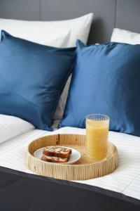 Postel nebo postele na pokoji v ubytování Centra Hotel Winterthur