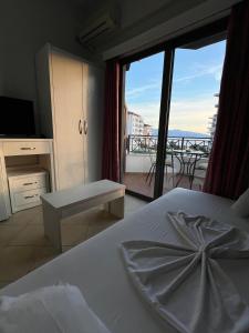 Postel nebo postele na pokoji v ubytování Privé City Hotel