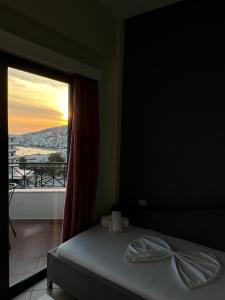 Postel nebo postele na pokoji v ubytování Privé City Hotel