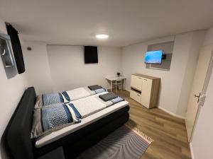 Ένα ή περισσότερα κρεβάτια σε δωμάτιο στο Barrierefreies Altstadtappartement in Osterode