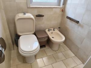 Koupelna v ubytování Casa "Sole Naxos" + 22 fotografií