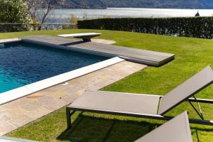 Bazén v ubytování Villa Principessa - Stunning Villa with Panoramic Lake Como Views nebo v jeho okolí
