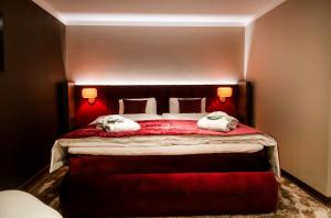 Hotel Jakobwirt Westendorf客房内的一张或多张床位