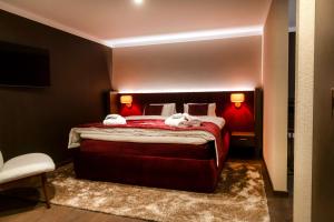 Hotel Jakobwirt Westendorf客房内的一张或多张床位