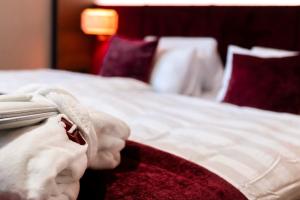 Hotel Jakobwirt Westendorf客房内的一张或多张床位