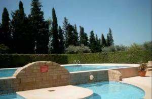 Swimmingpoolen hos eller tæt på Maisonnette en Provence