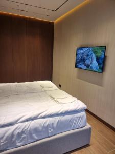 Postel nebo postele na pokoji v ubytování Premium apartment in Porta Batumi Tower
