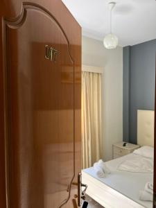 Postel nebo postele na pokoji v ubytování Privé City Hotel
