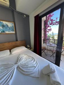 Postel nebo postele na pokoji v ubytování Privé City Hotel