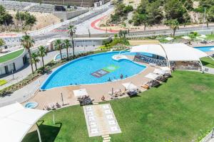 an overhead view of a swimming pool at a resort at Sunset Waves IV by Terreta Rentals in Benidorm