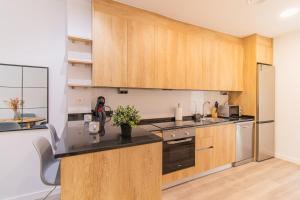 Η κουζίνα ή μικρή κουζίνα στο Your luxury getaway in downtown Zaragoza