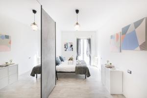 En eller flere senge i et værelse på Easylife - Milano - Borsi 2 - Navigli