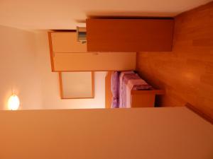 Postel nebo postele na pokoji v ubytování Apartments Ana