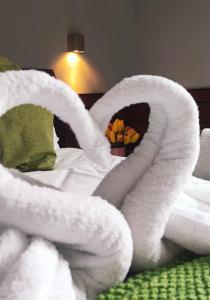 Postel nebo postele na pokoji v ubytování Romalive Hotel