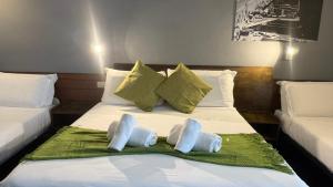 Postel nebo postele na pokoji v ubytování Romalive Hotel