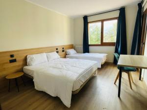 Postel nebo postele na pokoji v ubytování Cubez Viladrau + 37 fotografií