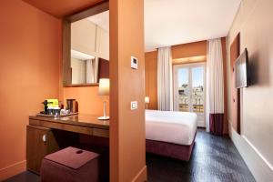 Postel nebo postele na pokoji v ubytování Mascagni Luxury Rooms & Suites