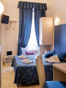 Katil atau katil-katil dalam bilik di Albergo Marechiaro