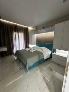 Postel nebo postele na pokoji v ubytování Evelina Luxury Suites in Corfu