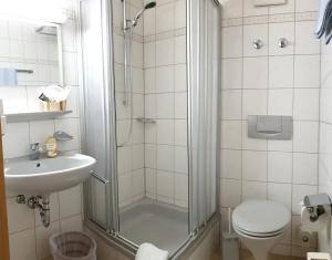 Koupelna v ubytování Garni Hotel Adler Post + 17 fotografií