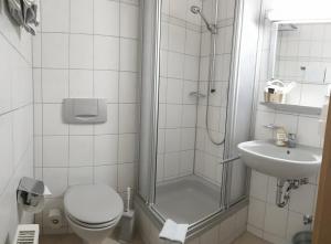 Koupelna v ubytování Garni Hotel Adler Post