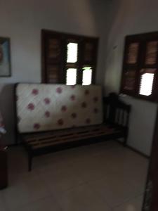 Khu vực ghế ngồi tại Casa com piscina Novo Iguape