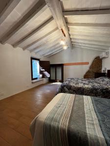 Ένα ή περισσότερα κρεβάτια σε δωμάτιο στο Agriturismo La Torre Di Monsindoli +39 φωτογραφίες
