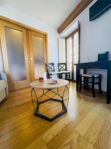 Telewizja i/lub zestaw kina domowego w obiekcie Apartamentos Casa de La Inmaculada