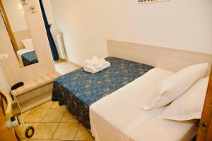 Katil atau katil-katil dalam bilik di Albergo Marechiaro