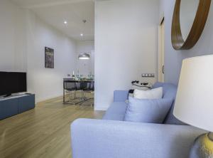 Televízia a/alebo spoločenská miestnosť v ubytovaní The Gaudi Suites II + 37 fotografií
