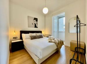 Posteľ alebo postele v izbe v ubytovaní BarcelonaForRent The Gaudi Suites