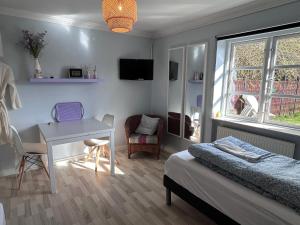 Posezení v ubytování Piccobello Bed & Breakfast Valløby Køge
