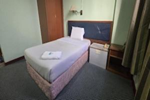 Postel nebo postele na pokoji v ubytování Hotel O Hotel Ramai