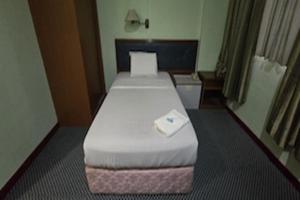 Postel nebo postele na pokoji v ubytování Hotel O Hotel Ramai