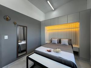 Katil atau katil-katil dalam bilik di Loft Vichy - 800m do Parque das Águas