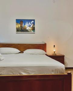 Postel nebo postele na pokoji v ubytování FAMAGOSTA Home