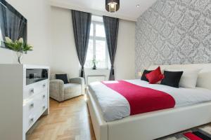 Posteľ alebo postele v izbe v ubytovaní Neo Apartments