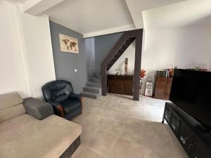 Μια τηλεόραση ή/και κέντρο ψυχαγωγίας στο Maison DEBES