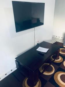 TV a/nebo společenská místnost v ubytování Malias furnished apartment + 2 fotografie