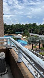 Swimmingpoolen hos eller tæt på Gran Lençóes Flat Residence